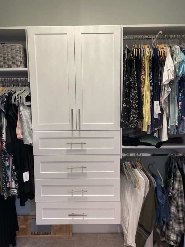 Custom closet system with drawers, shelving and double hanging, built by Sidney Design & Build in Winchester, VA